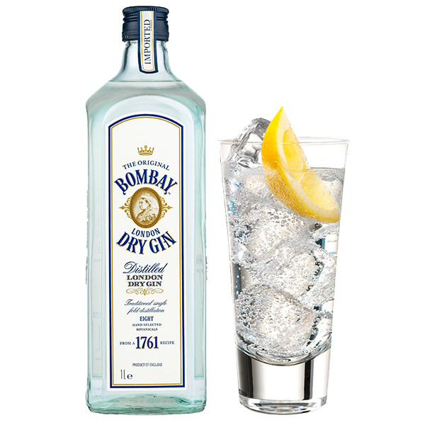 Botella bombay dry gin con vaso de cóctel